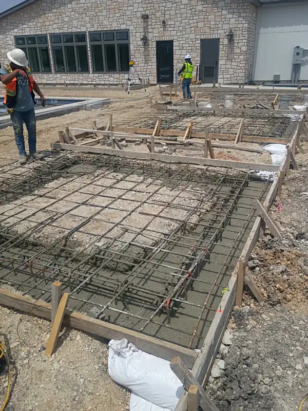 Concrete foundation rebar, new pour in progress