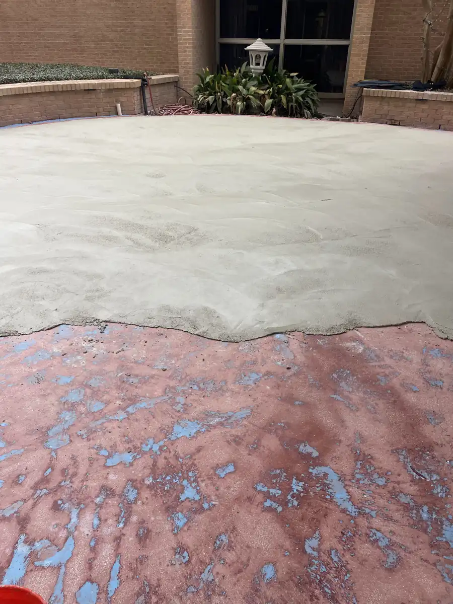 Concrete overlay resurfacing in progress, old versus new contrast