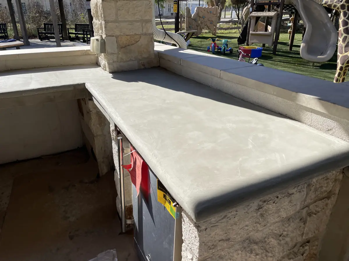 Outdoor kitchen, concrete countertop on stone base