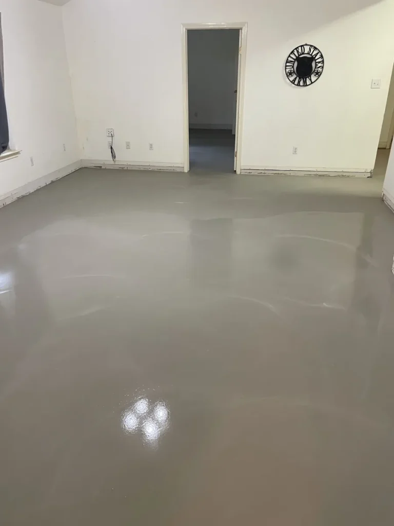 Stained and polished concrete floor, smooth gray finish