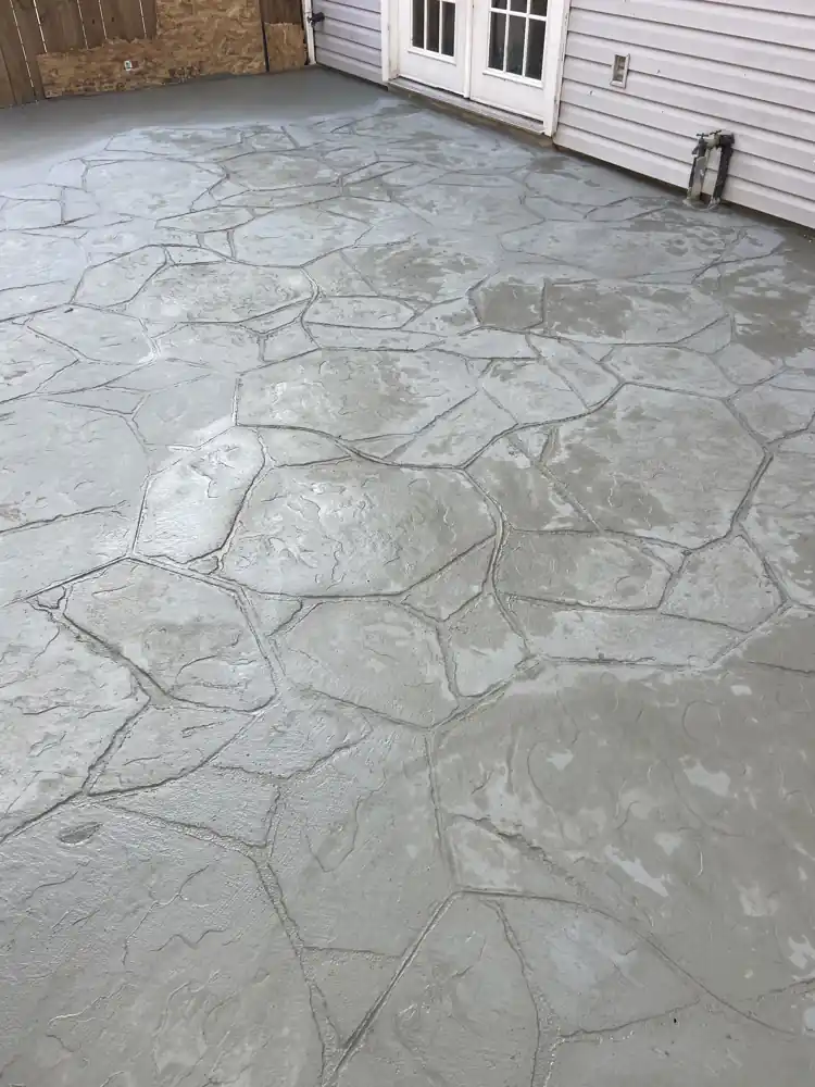 Stamped concrete patio, random stone pattern